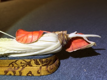 A Chinese polychrome ivory group of a cricket on cabbage, early 20th C.