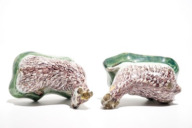 A pair of Dutch Delft polychrome models of goats on a ground, 18th C.