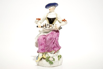 A Meissen porcelain Commedia del'Arte figure of Colombine playing a hurdy-gurdy, Germany, 18th C.