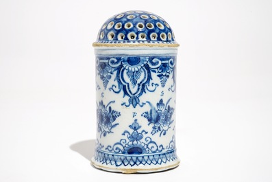 A Dutch Delft blue and white caster, early 18th C.