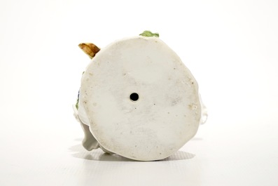 A Meissen porcelain Commedia del'Arte figure of Colombine playing a hurdy-gurdy, Germany, 18th C.