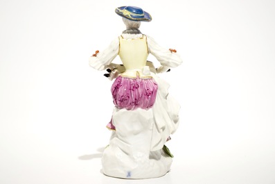 A Meissen porcelain Commedia del'Arte figure of Colombine playing a hurdy-gurdy, Germany, 18th C.