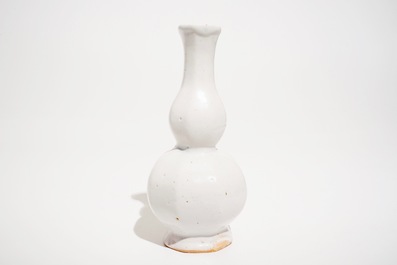 A white Dutch Delft gourd-shaped vase, 18th C.