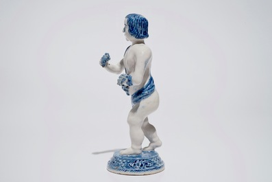 A Dutch Delft blue and white model of Bacchus, early 18th C.