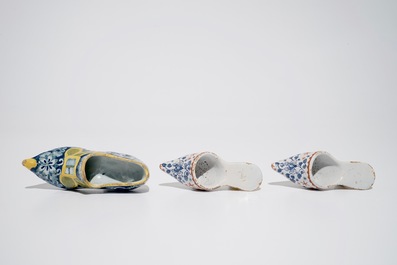 Three polychrome Dutch Delft models of shoes, 18th C.