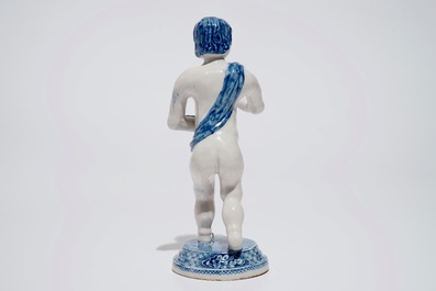 A Dutch Delft blue and white model of Bacchus, early 18th C.