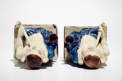A pair of German faience models of Buddhas in Delft style, 1st half 18th C.