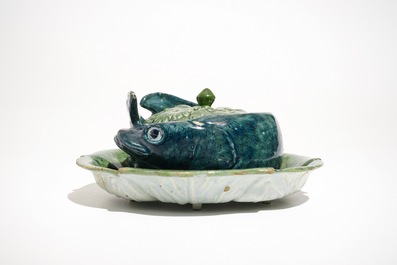 A polychrome Dutch Delft eel-shaped tureen and cover on stand, 18th C.