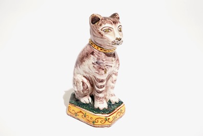 A polychrome Dutch Delft model of a cat, 19th C.