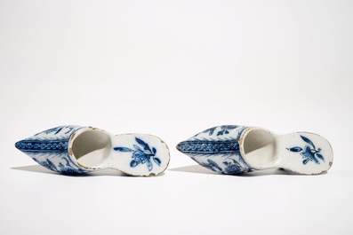 A pair of Dutch Delft blue and white slippers with floral design, 18th C.