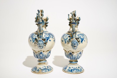 A pair of blue and white French faience ewers, Moustiers, 18th C.