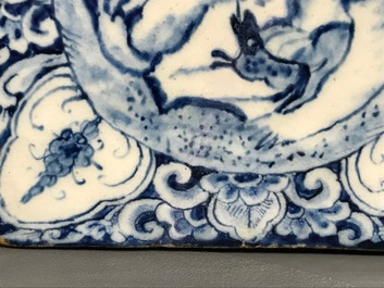 A rectangular Dutch Delft blue and white tea caddy with erotical design, 18th C.