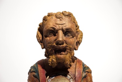 A wooden beam support in the shape of a satyr above a lion crest, The Netherlands, 17th C.