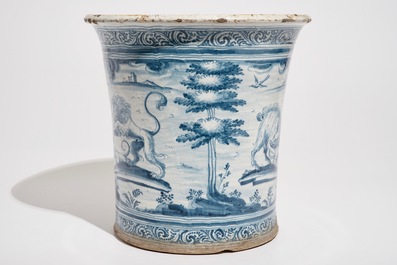 A large blue and white armorial jardiniere with fighting animals, Talavera, Spain, 17/18th C.