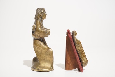 A small gilt bronze model of a Virgin and a bronze luster ornament shaped as a saint, 13/15th C.