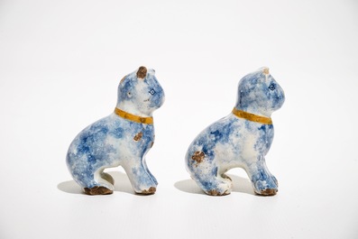 A pair of small polychrome Dutch Delft models of cats, 18th C.