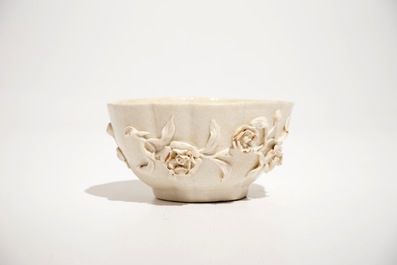 A Doccia porcelain cup and saucer with applied floral design, Italy, 18th C.