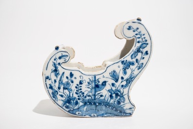 A Dutch Delft blue and white pipe stand modelled as a sledge, 18th C.