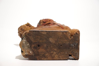 A wooden beam support in the shape of a satyr above a lion crest, The Netherlands, 17th C.