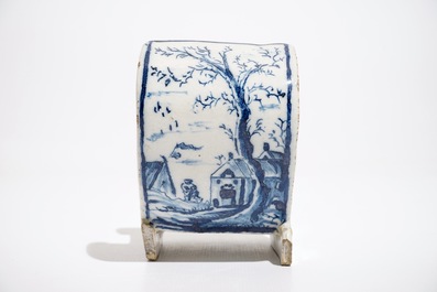 A Dutch Delft blue and white pipe stand modelled as a sledge, 18th C.