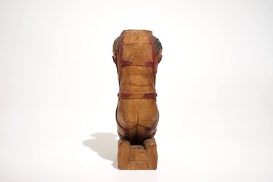 A wooden beam support in the shape of a satyr above a lion crest, The Netherlands, 17th C.