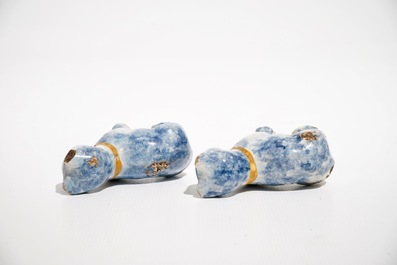 A pair of small polychrome Dutch Delft models of cats, 18th C.