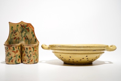 A French stoneware strainer and a wall hanger for cutlery, Aiglefontaine, 18th C.