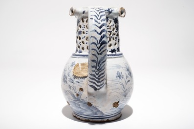 A French faience blue and white puzzle jug, poss. Lille, 18th C.