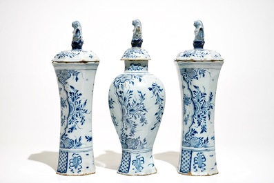 A tall Dutch Delft blue and white three-piece garniture, 18th C.