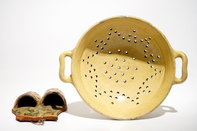 A French stoneware strainer and a wall hanger for cutlery, Aiglefontaine, 18th C.