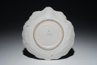 A French faience shell-shaped dish with floral design, Joseph Hannong, Strasbourg, 18th C.