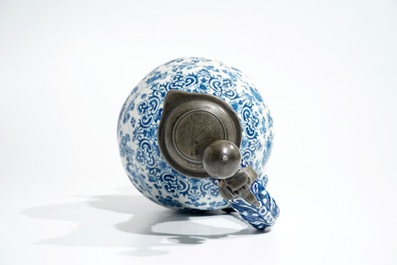 An attractive Dutch Delft blue and white gadrooned pewter-mounted jug, 2nd half 17th C.