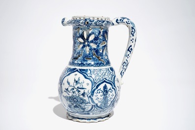 A Dutch blue and white chinoiserie puzzle jug, Delft or Rotterdam, dated 1734