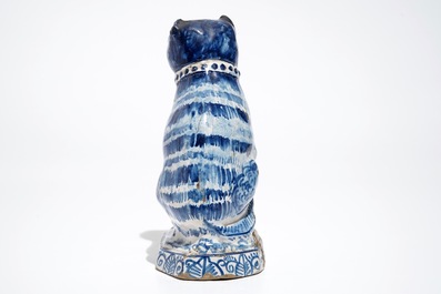 A Dutch Delft blue and white model of a cat, 1st half 19th C.