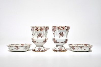 A pair of Dutch Delft manganese jardinieres on stands with floral designs, 18th C.