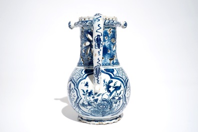 A Dutch blue and white chinoiserie puzzle jug, Delft or Rotterdam, dated 1734