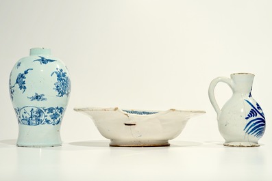 A blue and white French faience shaving bowl, a chinoiserie vase and a jug, Nevers and Moustiers, 17/18th C.