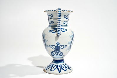 A Dutch Delft blue and white altar vase with IHS inscription, 18th C.