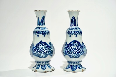 A pair of Dutch Delft blue and white vases, 17th C.