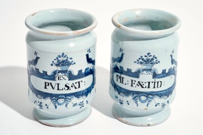 A pair of French faience Delft style albarello drug jars, Lille, 18th C.