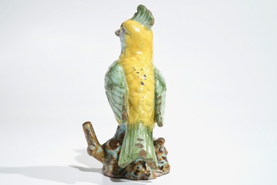 A polychrome Dutch Delft or French faience model of a bird, 18/19th C.