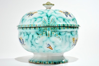 A polychrome Brussels faience tureen on stand with butterflies and caterpillars, 18/19th C.