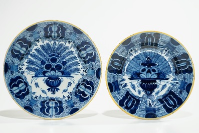 Four Dutch Delft blue and white and polychrome peacock's tail plates, 18th C.