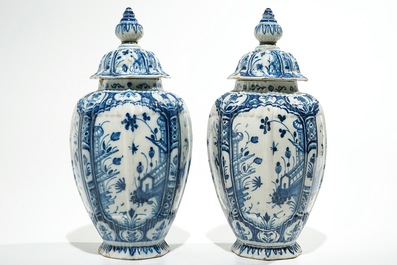 A pair of Dutch Delft blue and white chinoiserie covered vases, 18th C.