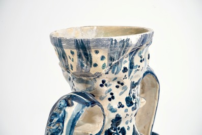 A Spanish pottery blue and white two-handled vase and cover, Triana, Seville, 18th C.