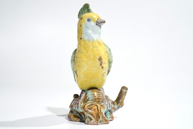 A polychrome Dutch Delft or French faience model of a bird, 18/19th C.
