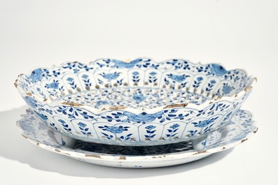 A Dutch Delft blue and white strawberry strainer on stand with pseudo-Chinese mark, 18th C.