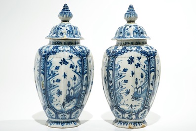 A pair of Dutch Delft blue and white chinoiserie covered vases, 18th C.