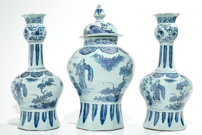 A large Dutch Delft blue and white three-piece chinoiserie garniture, 2nd half 17th C.