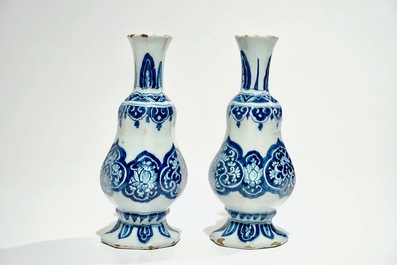 A pair of Dutch Delft blue and white vases, 17th C.